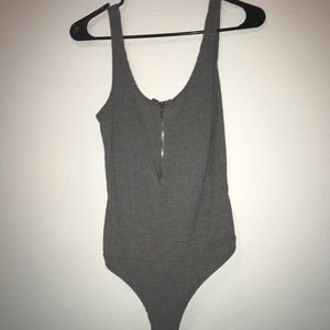 grey zip up bodysuit